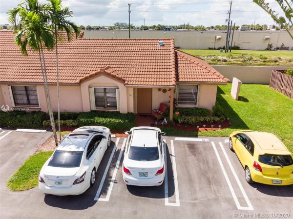 Villa Homes At The Moors, 6018 NW 170th Ter, Country Club, Florida 33015, image 2