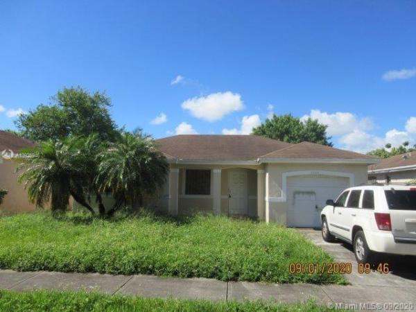 Amerihomes, 28424 SW 135th Ave, Three Lakes, Florida 33033, image 2