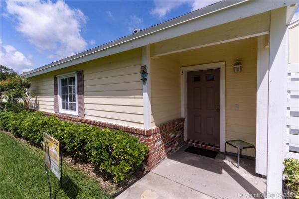 Village Homes At Country Walk, 13777 SW 147th Cir Ln #3-19, Country Walk, Florida 33186, image 2