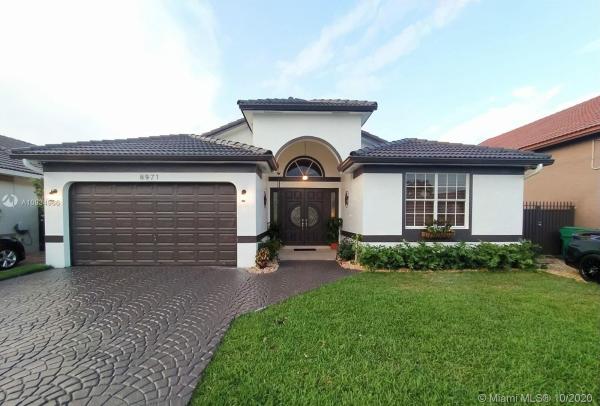 Florida Tropical Estates, 8971 NW 148th Ter, Miami Lakes, Florida 33018, image 2