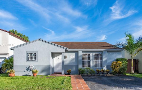 Country Lake Homes, 18989 NW 63rd Ct Cir, Country Club, Florida 33015, image 2