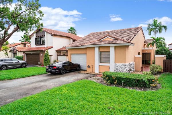 The Moors Cluster Homes, 6330 NW 173rd Ln, Country Club, Florida 33015, image 2