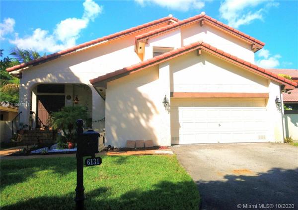 Patio Homes At The Moors, 6131 NW 174th Ter, Country Club, Florida 33015, image 2