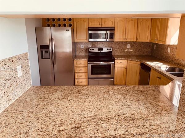 Poinciana Lakes Villas, 17405 NW 75th Pl #212, Country Club, Florida 33015, image 2