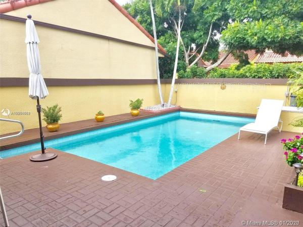 California Club Homes, 1018 NE 203rd Ln, Ives Estates, Florida 33179, image 2