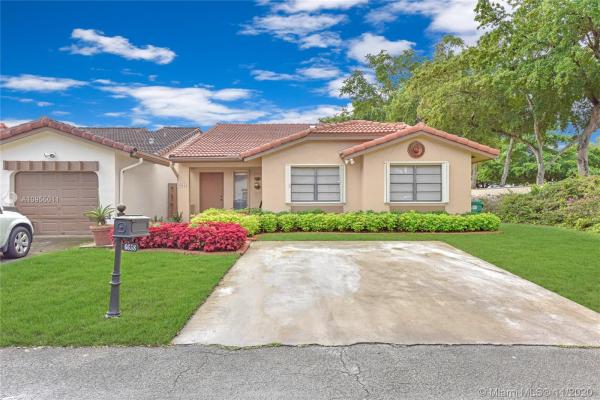 The Moors Townhouses, 6658 NW 174th Ln, Country Club, Florida 33015, image 2