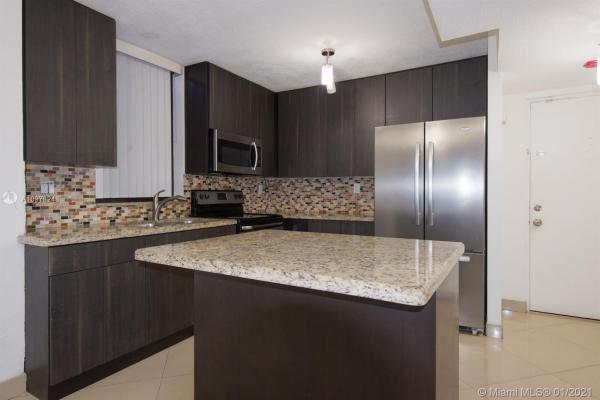 The Courtyard Villas, 18000 NW 68th Ave #117A, Country Club, Florida 33015, image 2