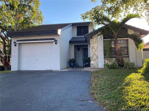 The Moors Cluster Homes, 6308 NW 174th Ter, Country Club, Florida 33015, image 2