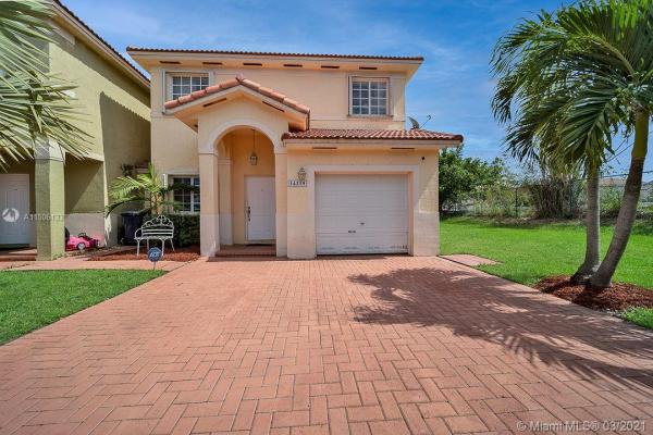 Precious Homes At Twin Lakes, 14359 SW 133rd Ct, Three Lakes, Florida 33186, image 2