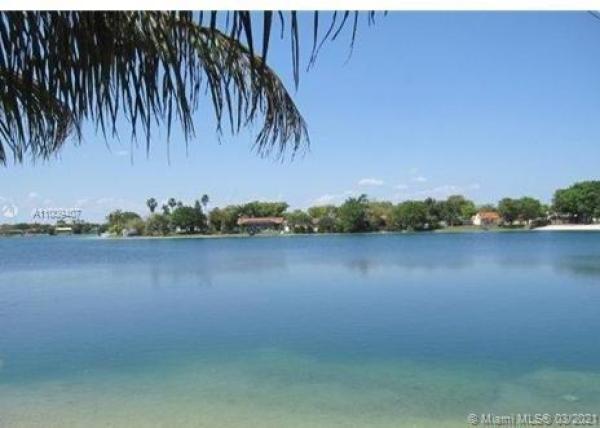 Country Lake Homes, 18931 NW 63rd Ct Cir, Country Club, Florida 33015, image 2