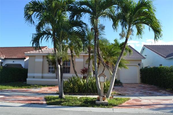 Florida Tropical Estates, 9032 NW 147th Ter, Miami Lakes, Florida 33018, image 2