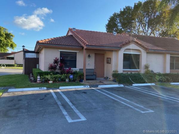 Villa Homes At The Moors, 6192 NW 170th Ln #6192, Country Club, Florida 33015, image 2