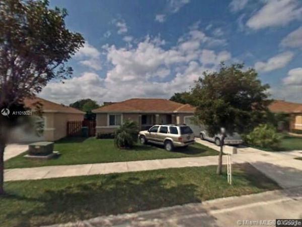 Amerihomes, 28418 SW 135th Ave, Three Lakes, Florida 33033, image 2