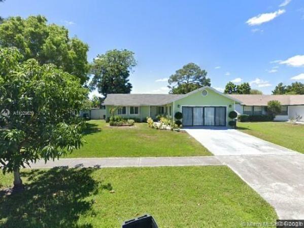 The Forest Homes, 5131 El Claro Cir, West Palm Beach, Florida 33415, image 2