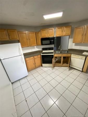 The Moors Cluster Homes, Country Club, Florida 33015, image 2
