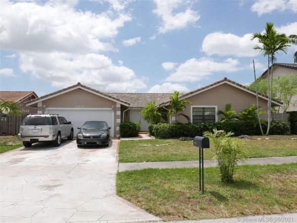 Country Lake Manors, 6350 NW 200th Ter, Country Club, Florida 33015, image 1