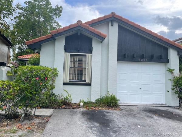 The Moors Cluster Homes, 6244 NW 175th Ter, Country Club, Florida 33015, image 2
