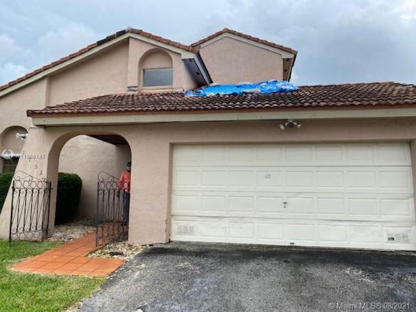 Patio Homes At The Moors, 17532 NW 61st Ct N, Country Club, Florida 33015, image 2