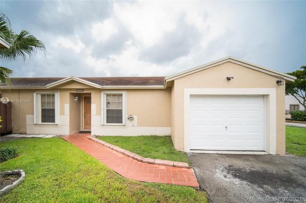 Country Lake Homes, 18926 NW 63rd Ct Cir, Country Club, Florida 33015, image 2