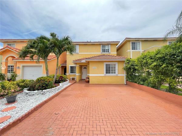 Precious Homes At Twin Lakes, 14344 SW 136th Ct, Three Lakes, Florida 33186, image 2