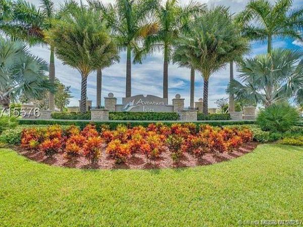 Champion Lakes, 311 NE 194th Ln #311, Ives Estates, Florida 33179, image 2