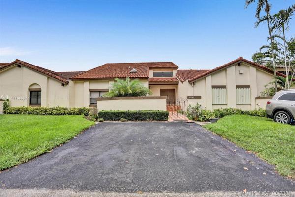 The Moors Townhouses, 6645 NW 181st Ln, Country Club, Florida 33015, image 2