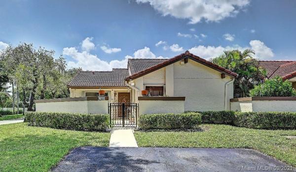 The Moors Townhouses, 6632 NW 179th Ter #6632, Country Club, Florida 33015, image 2