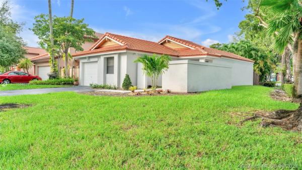 The Moors Cluster Homes, 6301 NW 173rd Ln, Country Club, Florida 33015, image 2