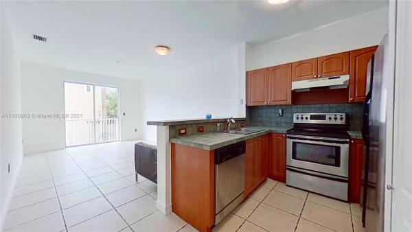 Shoma Homes At Country Club, 7250 NW 177th St #208-16, Hialeah, Florida 33015, image 2