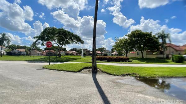 The Moors Townhouses, 18156 NW 66th Ct, Country Club, Florida 33015, image 1