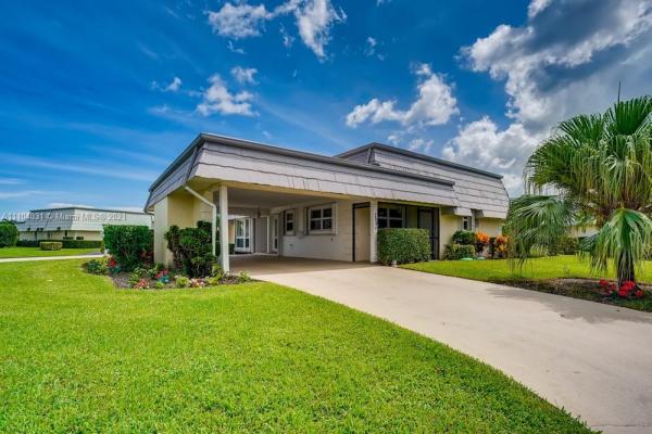 French Royale Villas, 388 Villa Dr S, Atlantis, Florida 33462, image 1