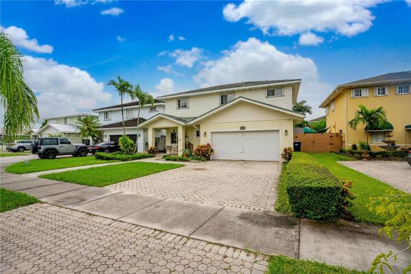 Adventure Homes, 14750 SW 141st Ter, Country Walk, Florida 33196, image 2