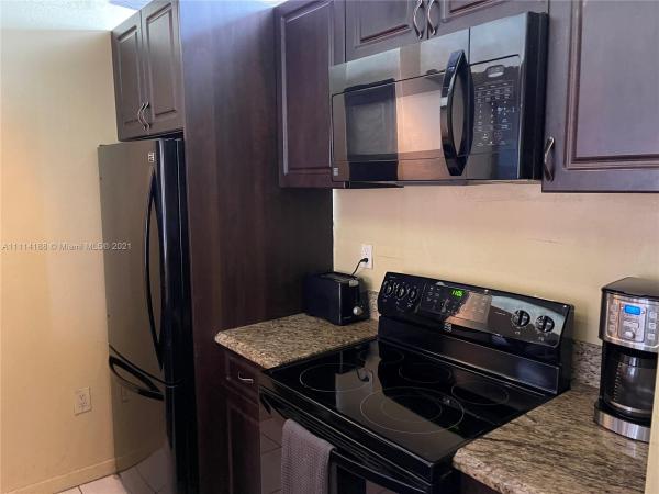 Las Brisas Country Club Of Miami, 7075 NW 186th St #C511, Country Club, Florida 33015, image 1