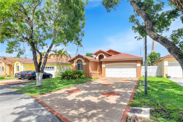 Turtle Run Estates, 16921 NW 75th Ct, Country Club, Florida 33015, image 2