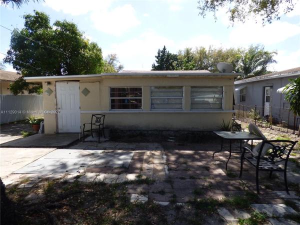 Seminole Lawn, 3360 NW 49th St, Brownsville, Florida 33142, image 1