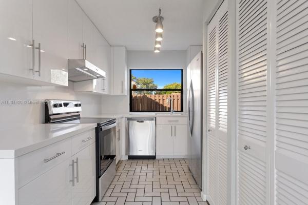 Villa Homes At The Moors, 6297 NW 170th Ln #TWNHSE, Country Club, Florida 33015, image 2