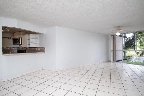 Las Brisas Country Club Of Miami, 6995 NW 186th St #E203, Country Club, Florida 33015, image 1
