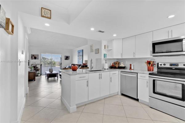 Vista Del Lago, 9911 W Okeechobee Rd #1-502, Hialeah Gardens, Florida 33016, image 1