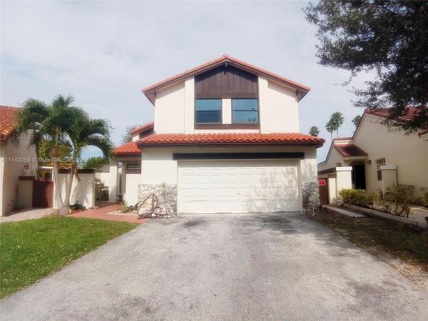 The Moors Cluster Homes, 17925 NW 63rd Ct, Country Club, Florida 33015, image 2