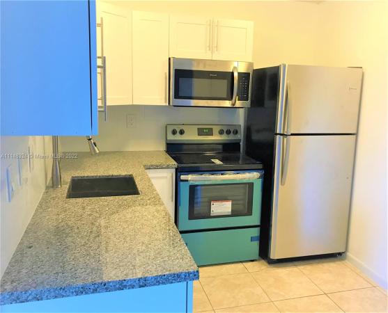 Montecarlo, 484 NW 165th Street Rd #A215, Golden Glades, Florida 33169, image 2