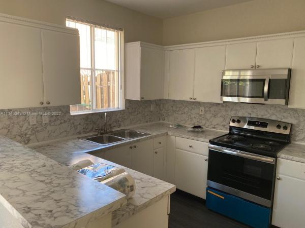 Shoma Villas At Country Club Of Miami, 7020 NW 177th St #101B, Country Club, Florida 33015, image 2