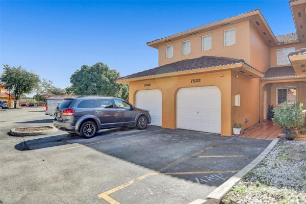 Lilandia Estates, 7532 NW 176th Ter #7532, Country Club, Florida 33015, image 2