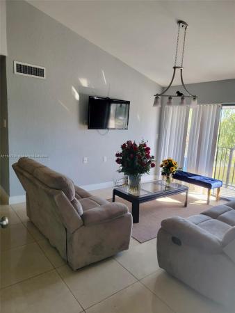Villa Bellini, 7235 NW 179 St #302, Country Club, Florida 33015, image 1