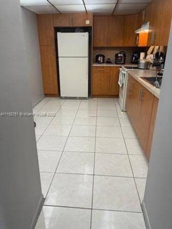 Coral Gate West, 7000 NW 186th St #4-325, Country Club, Florida 33015, image 2
