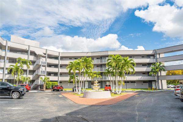 The Courtyard Villas, 18000 NW 68th Ave #302A, Country Club, Florida 33015, image 2