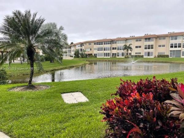 Karisa Gardens, 4800 NW 35th St #402, Lauderdale Lakes, Florida 33319, image 1