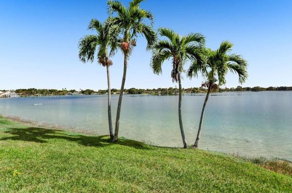 Townhomes Of Country Lake, 19209 NW 64th Ct, Country Club, Florida 33015, image 2