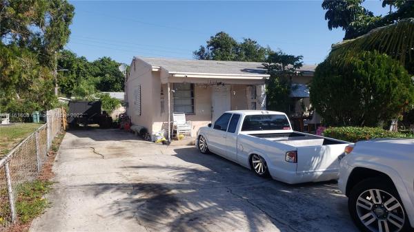 Whispering Palms, 1202 S 14th Ct S, Lake Worth Beach, Florida 33460, image 1