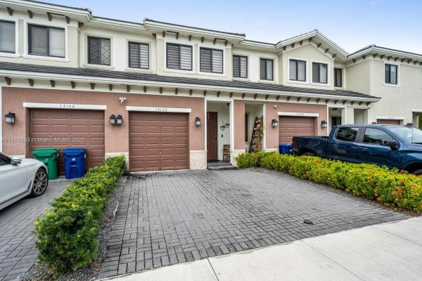 Hidden Lake Townhomes, 13130 SW 127th Ct, Three Lakes, Florida 33186, image 2