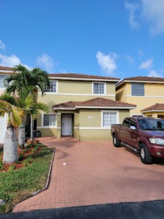 Precious Homes At Twin Lakes, 14352 SW 136th Ave, Three Lakes, Florida 33186, image 1